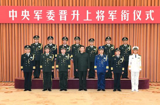 Seven Chinese military officers have been promoted to the rank of general, the highest rank for officers in active service in China, Dec. 12, 2019. (Xinhua/Li Gang)