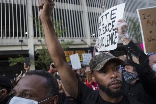 Protesters take part in a demonstration in Tulsa, Oklahoma, the United States, on June 20, 2020. (Photo by Alan Chin/Xinhua)